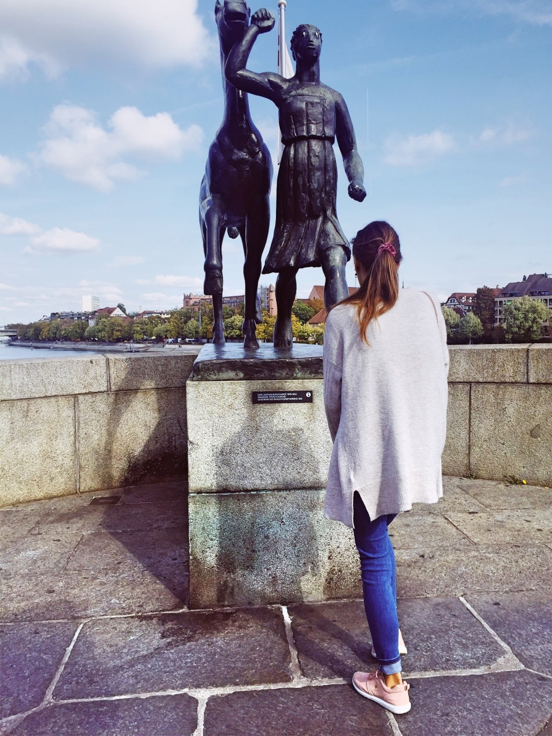 Rhine river Mittlere Brucke basel - statue amazon with a horse